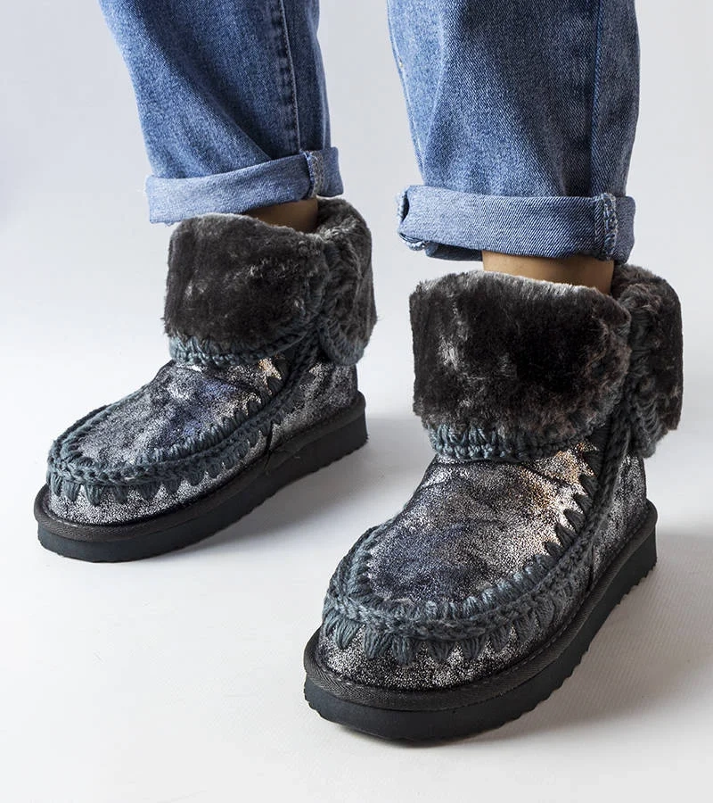 Eskimos metalic gri izolat cu Maggi